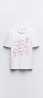 In The Garden Yazılı Fiyonk Baskılı Beyaz Kadın T-shirt