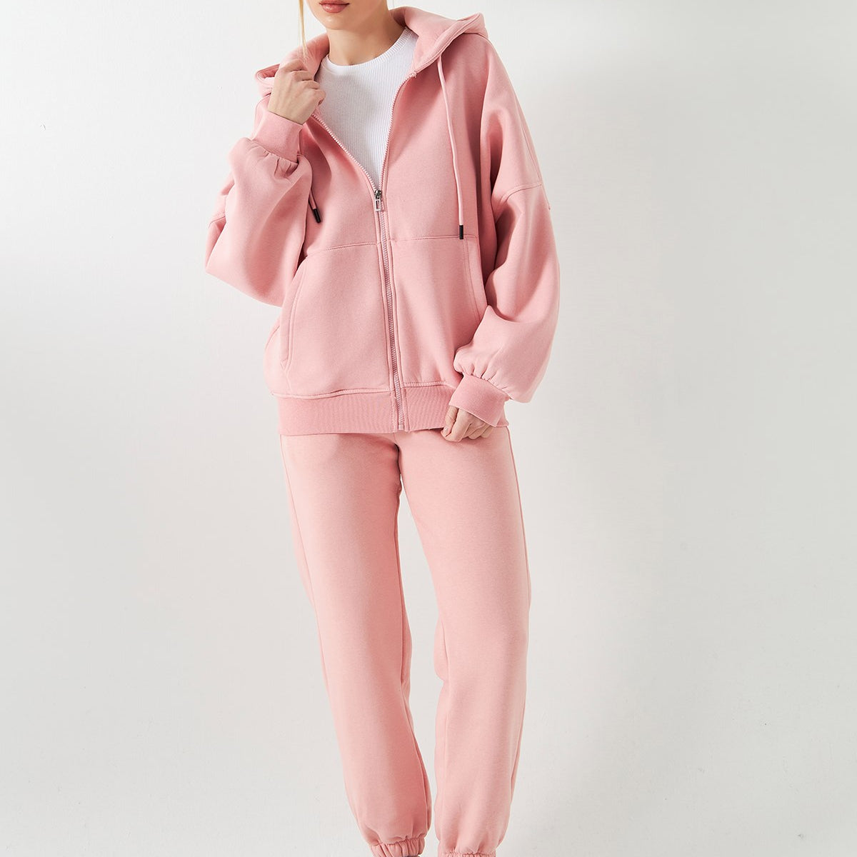 Kadın Oversize Eşofman Takımı Kordonlu Pembe – Fermuarlı, Kapüşonlu, Lastikli Paça, 3 İplik Polar