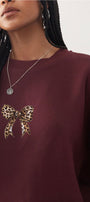Kadın Oversize Sweatshirt Leo Kurdele Baskılı Bordo – Bisiklet Yaka, 3 İplik Şardonlu Polar