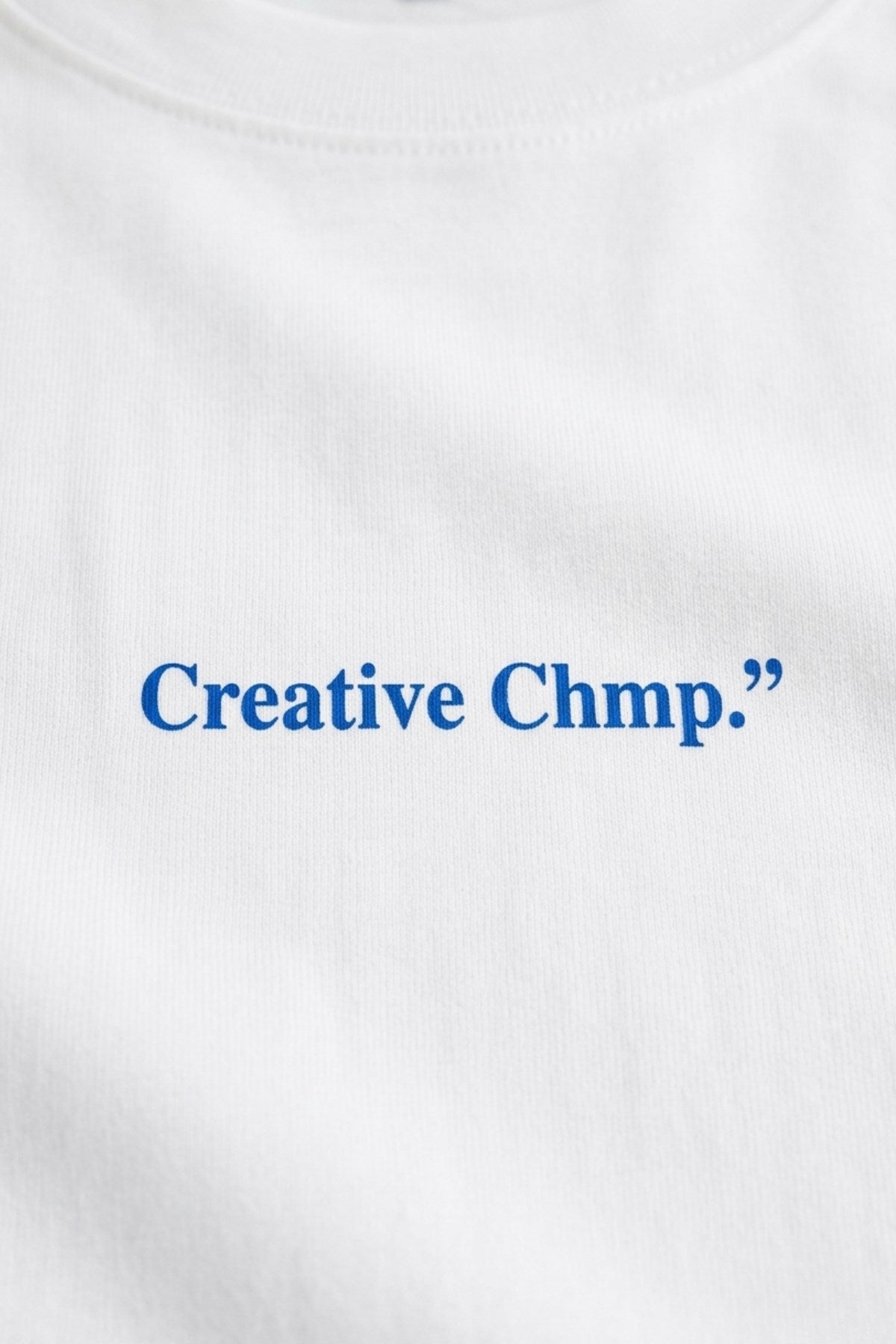 Erkek Oversize Tişört Creative Chmp  Baskılı Beyaz – Bisiklet Yaka, Rahat Kalıp, %100 Pamuk