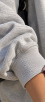 Kadın Oversize Hoodie Cry First Baskılı Gri Melanj – Kapüşonlu, Kanguru Cepli, Düşük Omuz