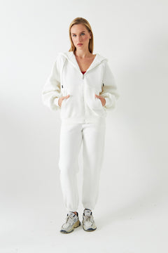 Kadın Oversize Eşofman Takımı Kordonlu Beyaz – Fermuarlı, Kapüşonlu, Lastikli Paça, 3 İplik Polar